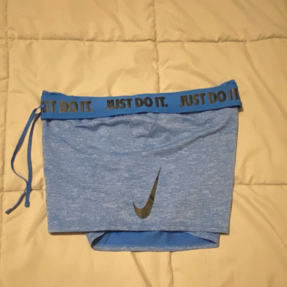Nike dri-fit training shorts with foldable Nike waistband.  Heather blue. Size M